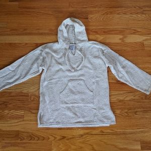 Woven cotton women's hooded pullover.